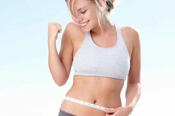 woman happy after fat reduction treatment Greater London (Hammersmith and Fulham)